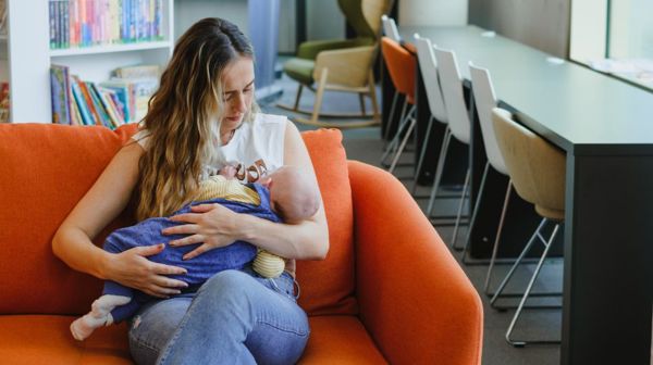 Woman Breastfeeding A Baby