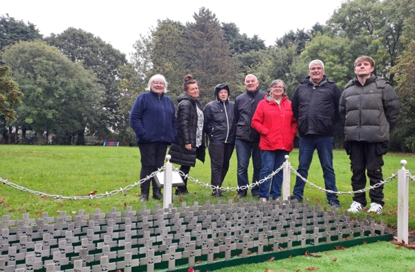 A group of volunteers from the Thurnscoe Flower Park Volunteers with new memorial crosses