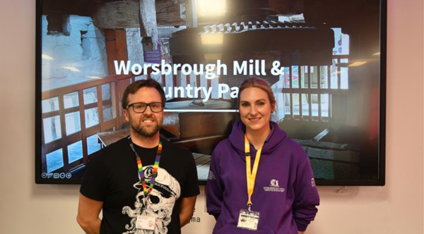 Two members of staff briefing students from Barnsley College on the Worsbrough Mill 2025 campaign