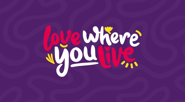 Love Where You Live Logo On Purple Background